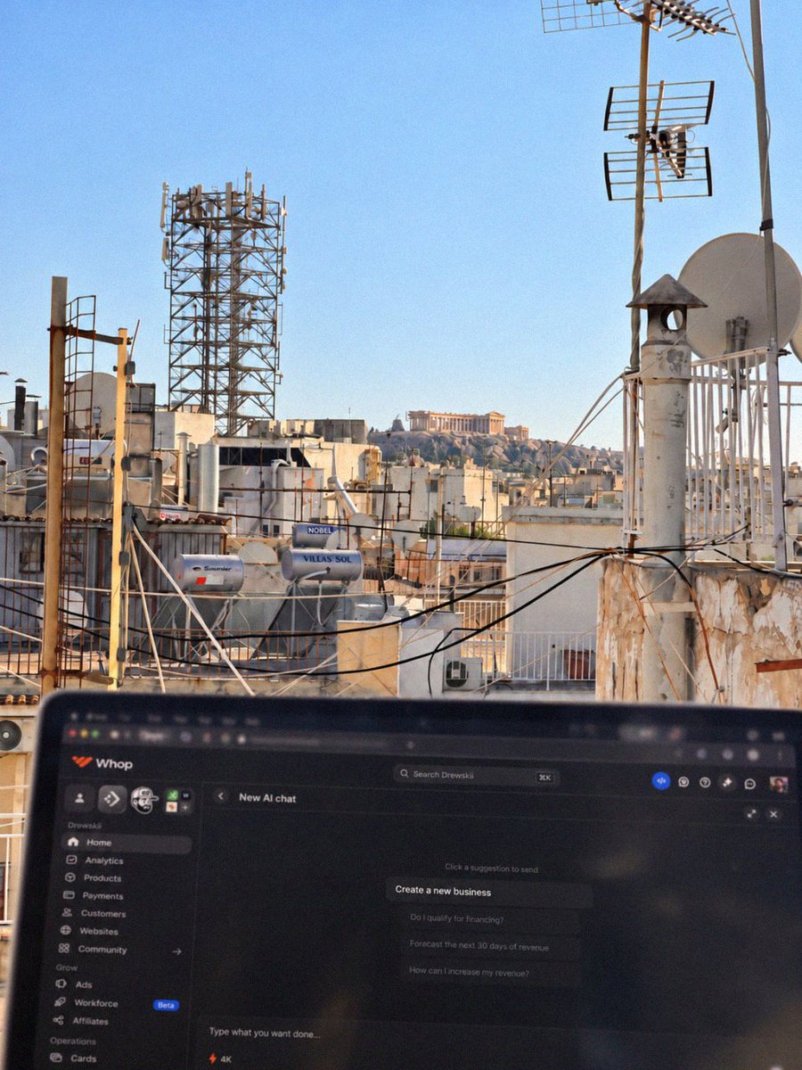 Athens rooftops with the Acropolis behind them, and a laptop open on Whop.